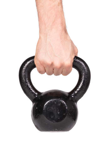 Black kettlebell isolated on a white backgroundの写真素材