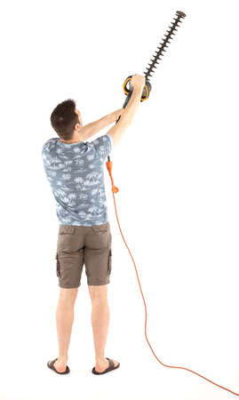 Man with hedge trimmer, isolated on white