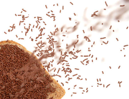 Typical dutch chocolate sprinkles falling (sprinkles), used on bread, cake or dessertsの写真素材