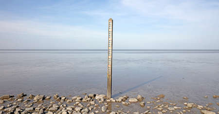 Old water level gauge in the Netherlands, Waddenseaの写真素材