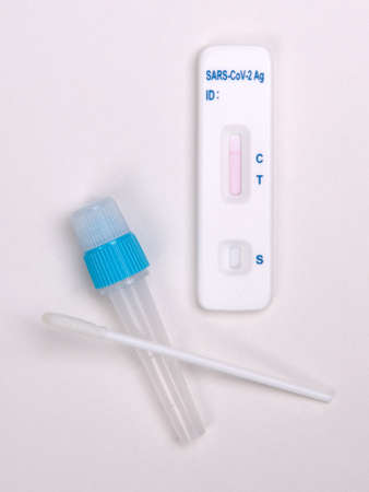 Rapid covid-19 strip test isolated on white - Negative tested