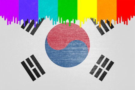 Paint (in the colors of the rainbow flag) is dripping over the national flag of South Koreaの写真素材