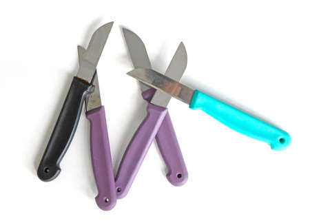 Five old kitchen knives, isolated on whiteの写真素材