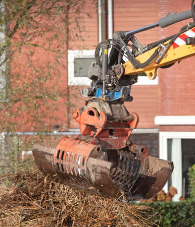 Gathering already with a large grab crane, the Netherlands