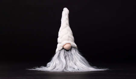 Christmas decoration: Santa Claus head isolated on black backgroundの写真素材