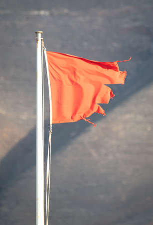 Red flag warning on beach in Spain (Lanzarote)の写真素材