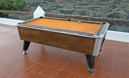 Old broken pool table outside on Lanzarote, Spain