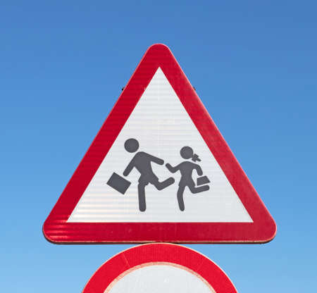 Traffic sign warning for playing children or crossing school children, Lanzarote (Spain)