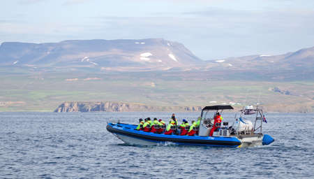 HÃºsavik, Iceland on August 2, 2021: Tourists on speedboat during starting whale watching tour from HÃºsavikのeditorial素材