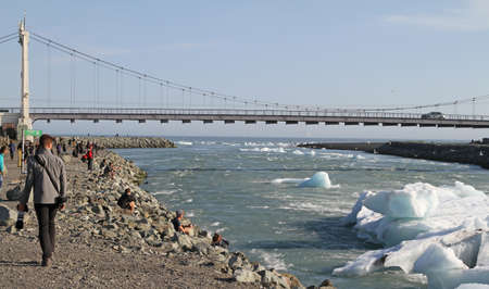 Jokulsarlon, Iceland on July 30, 2021: Glacier lagoon Jokulsarlon view on bridge and carpark