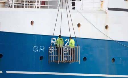 Reykjavik, Iceland on July 27, 2021: Large fishing vessel in a dry dock being repaintedのeditorial素材