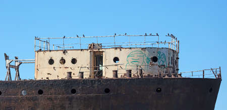 Pigeons resting on an old shipwreck in Arrecife (Lanzarote)