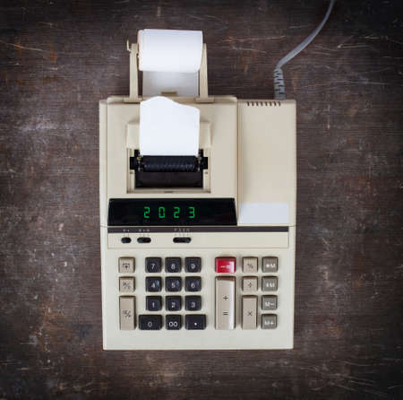 Old calculator showing a text on display - 2023の写真素材