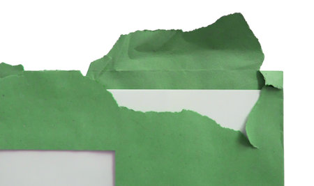 Torn envelope paper with white letter visible, isolatedの写真素材