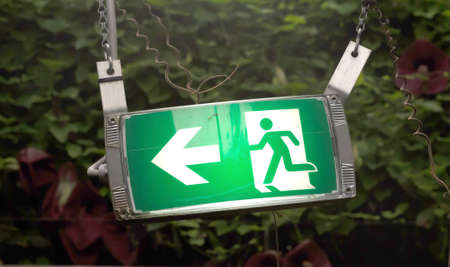 Emergency exit sign in a large greenhouseの写真素材