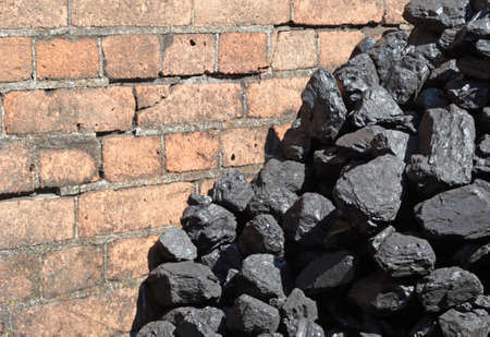 Heap of coal, stacked at a dutch houseの写真素材