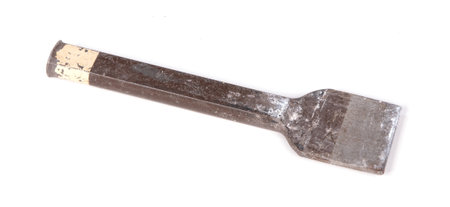 Old grungy chisel for stone works, isolated