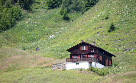Cabin in Switzerland, wooden cabin in the mountainsのeditorial素材
