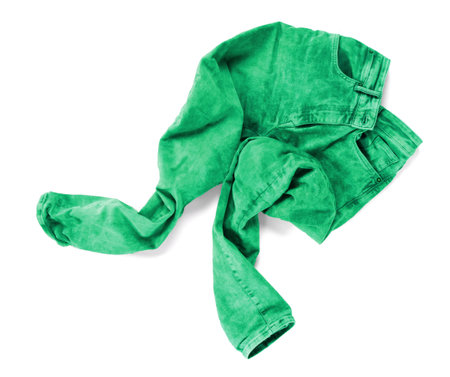 Worn green jeans isolated on a white backgroundの写真素材