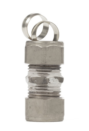 Steel fitting for plumbing pipes, connector for two different sizes, isolated on white