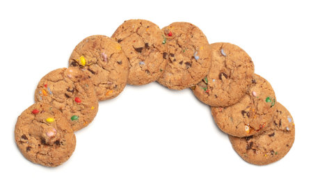 Cookies with colorful chocolate candy in them, isolated on whiteの写真素材