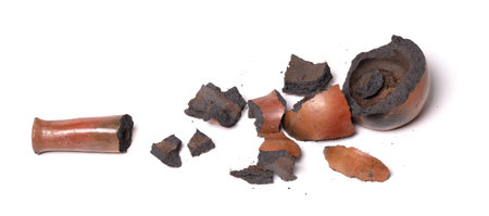 Old brown pottery, isolated on a white backgroundの写真素材