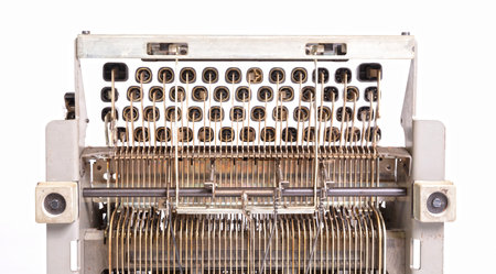 Broken metal typewriter, vintage object isolated, full frame