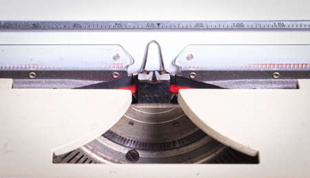 Broken metal typewriter, vintage object isolated, full frameの写真素材