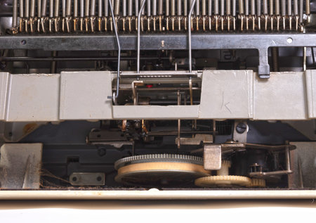Broken metal typewriter, vintage object isolated, full frameの写真素材