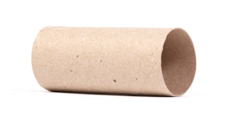 Closeup of one empty cardboard toilet roll, isolated on a white backgroundの写真素材