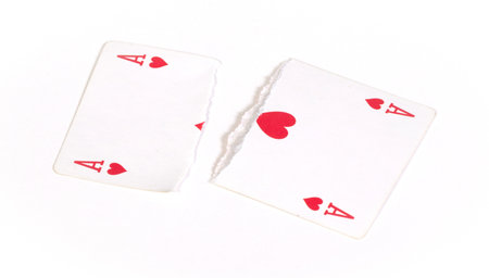 Playing card, torn into pieces, isolated on whiteの写真素材
