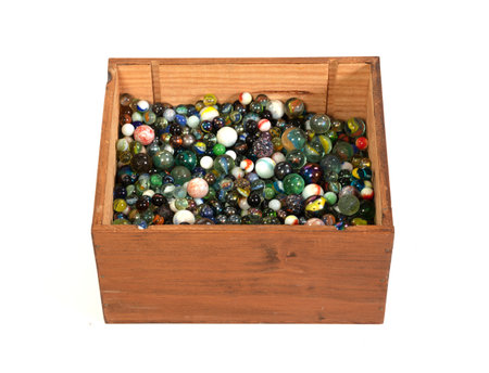 Collection of old glass marbles, isolated on whiteの写真素材