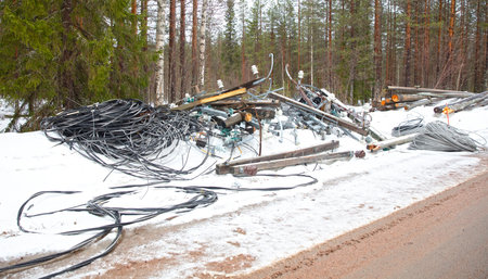 Power maintenance in Finland, replaced stuff is laying on the ground, winterの写真素材