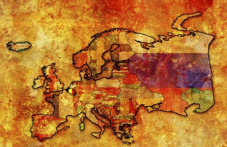 some very old grunge map of belgium with flag on map of europeの写真素材