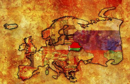 some very old grunge map of belarus with flag on map of europeの写真素材