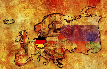 some very old grunge map of germany with flag on map of europeの写真素材
