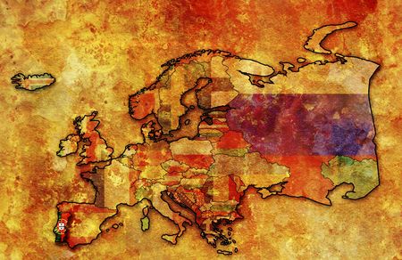 some very old grunge map of portugal with flag on map of europeの写真素材