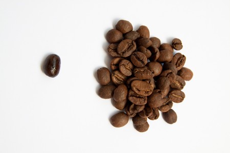 datailed macro shot of coffee beans in different colorsの写真素材