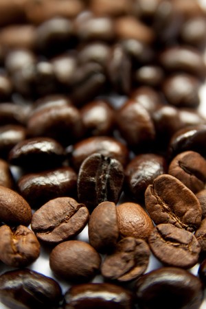 datailed macro shot of coffee beans in different colorsの写真素材