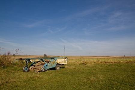 some old machine used for farming long time agoの写真素材