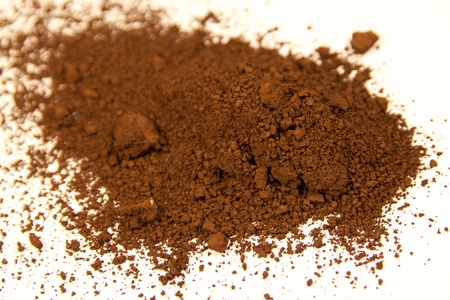 close up of a small portion of burnt umber pigment isolated over whiteの写真素材