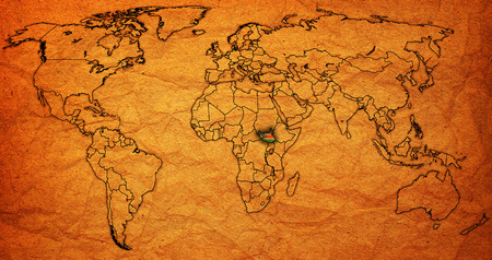 south sudan flag on old vintage world map with national bordersの写真素材