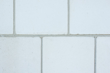 detail photo of white wall made of white bricks