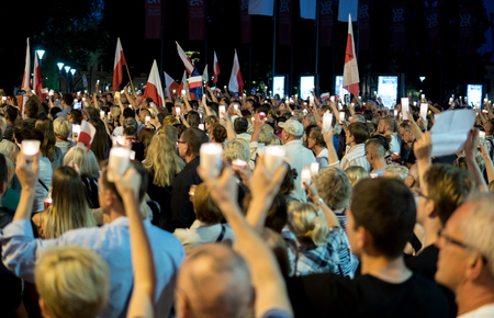crowd with candles and flags on demonstration  against destroying of supreme court by polish government. Lublin, Poland. 22 july 2017のeditorial素材