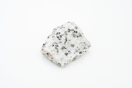 extreme close up with a lot of details of plagiogranite rock isolated over white background