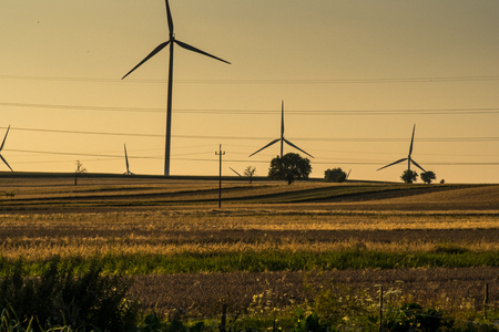 golden hour over rural landscape with fieldsの写真素材