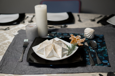 elegant table setting with decoration for dinner in regular homeの写真素材