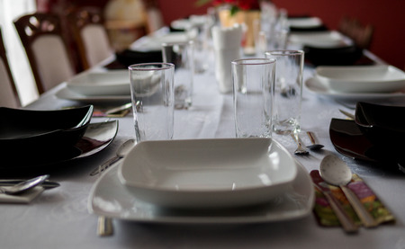 elegant table setting with decoration for dinner in regular homeの写真素材