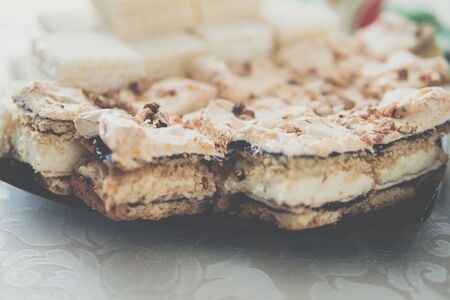 delicious cakes called pychotka or Pani Walewska with meringue and brittleの写真素材
