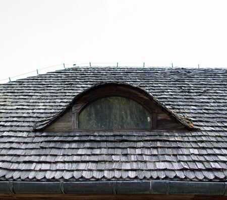 detail of old vintage window in a roof
